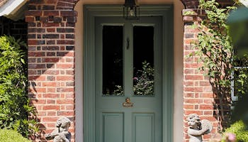 Painted front door brick entryway